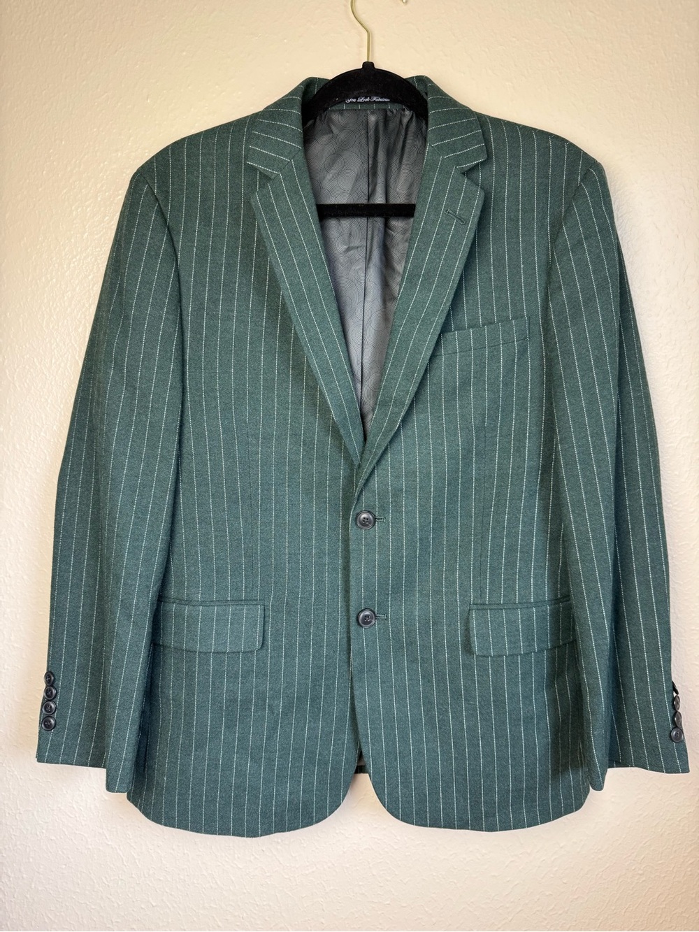 Nick Graham green pinstripe suit blazer